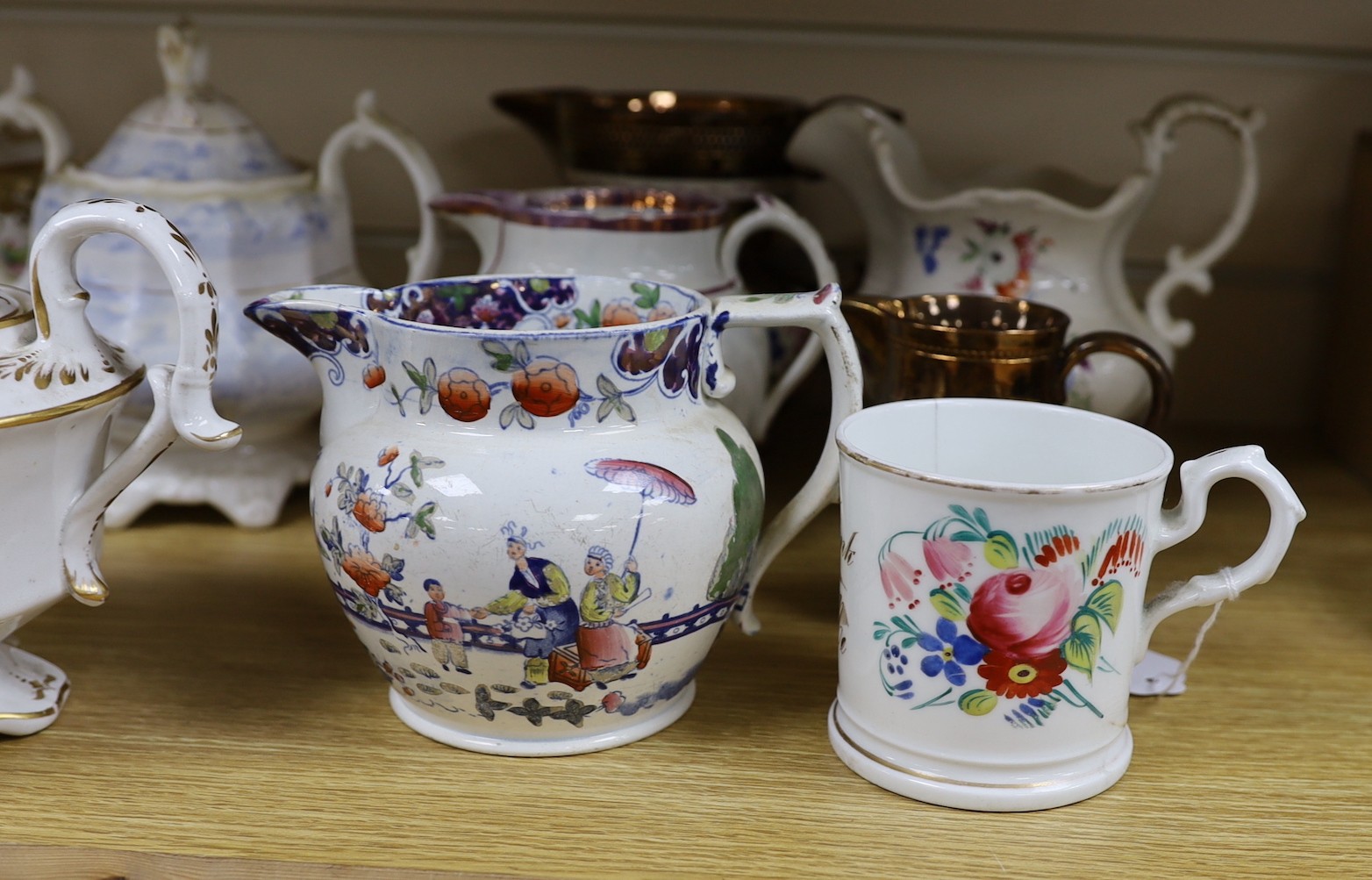 A collection of Victorian porcelain and pottery sucriers and jugs